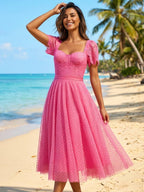 Elegant midi dress in flowing lace