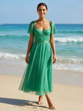 Elegant midi dress in flowing lace