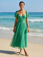 Elegant midi dress in flowing lace